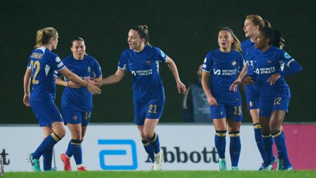 Chelsea's Niamh Charles celebrates her equaliser with her team-mates
