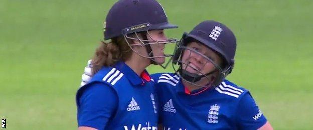 Natalie Sciver shares a grill kiss with Heather Knight as they celebrate the first ODI win against Pakistan