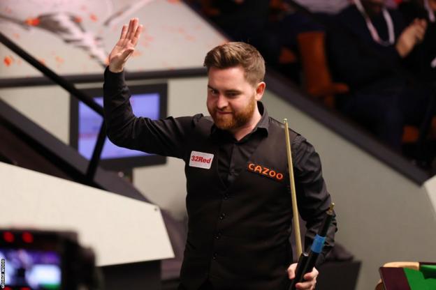 Jak Jones celebrates after beating Neil Robertson at the World Championship