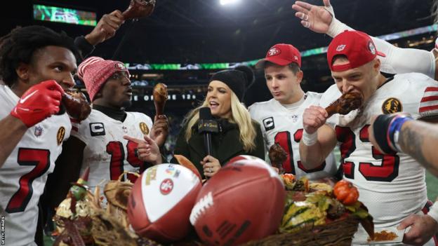 San Francisco 49ers players enjoy some turkey after their 2023 Thanksgiving win at the Seattle Seahawks