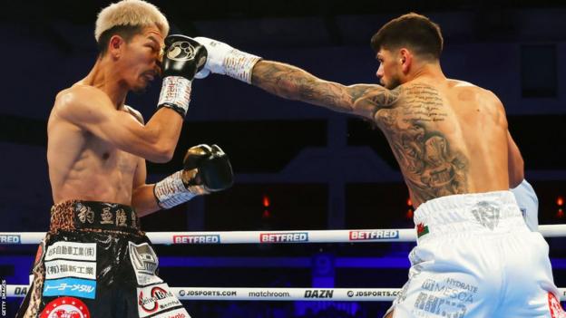 Joe Cordina punching Kenichi Ogawa