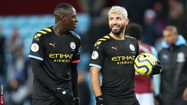 Benjamin Mendy (l) and Sergio Aguero