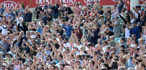 Everyone in the crowd was on their feet when Cook reached his century