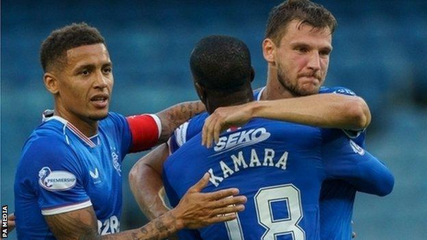 Rangers celebrate the opening goal from Borna Barisic (right)