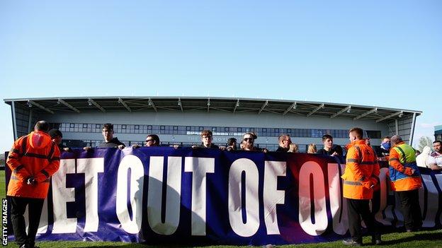 Oldham Athletic fans protesting