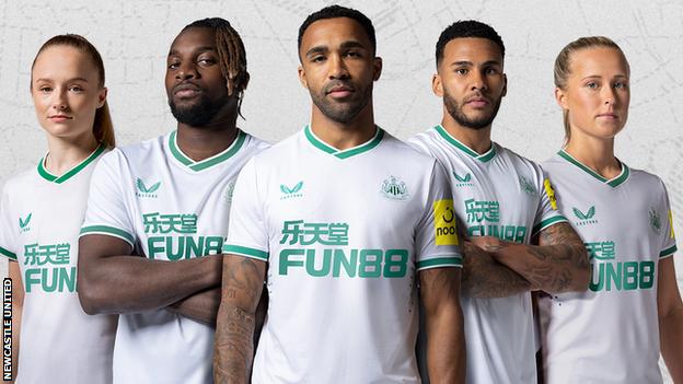 Newcastle United players wearing the new third kit