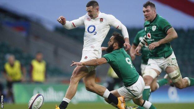 Jonny May runs through to score England's second try against Ireland