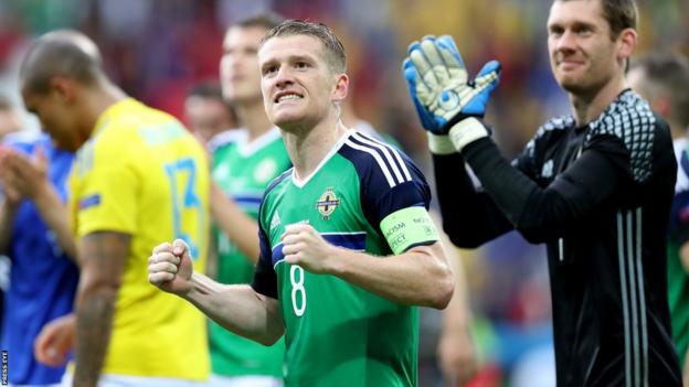 Steven Davis celebrates as Northern Ireland beat Ukraine