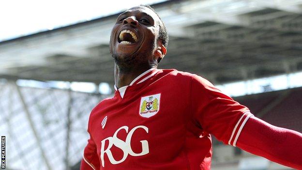 Bristol City's Jonathan Kodjia celebrates scoring against Huddersfield