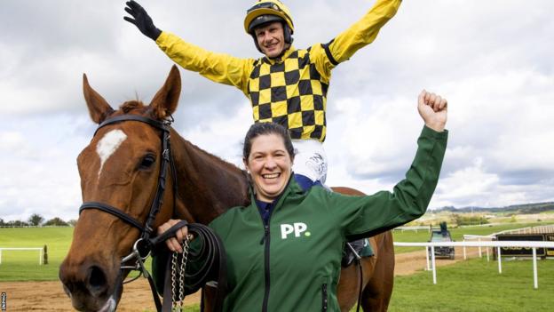 Paul Townend and groom Rachel Robins celebrate after winning the Champion Hurdle on State Man