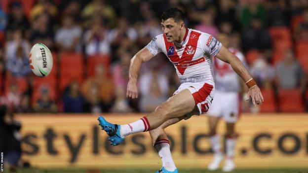 Lewis Dodd kicks the match-winning drop-goal