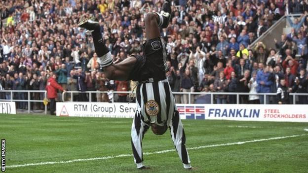 Faustino Asprilla celebrates scoring a goal for Newcastle United in 1997