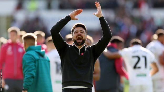 Russell Martin celebrates Swansea's win over Cardiff last October, which lifted his team to fourth in the Championship