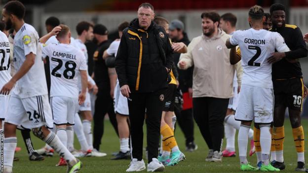 Newport County boss Graham Coughlan looks on after their heavy defeat at home to Crawley Town on Monday