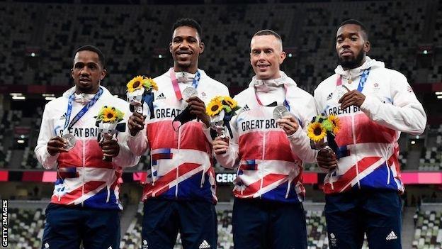 Team GB's men's 4x100m silver medallists on the podium in Tokyo