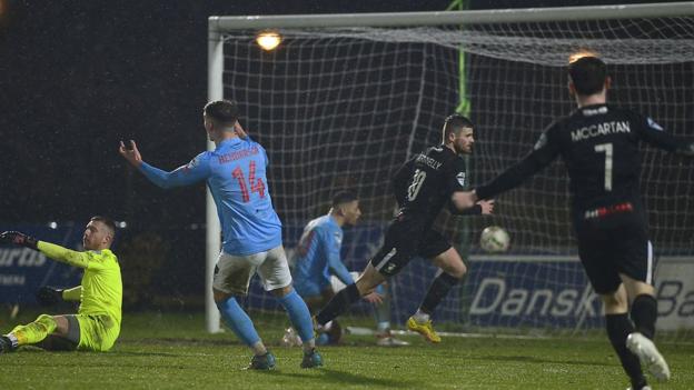 Rory Donnelly celebrates scoring for Glentoran against Ballymena