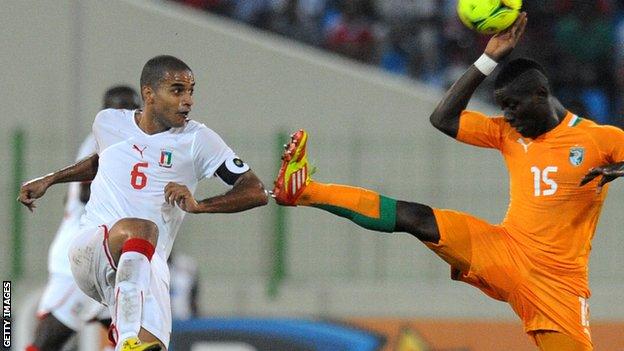 Juvenal Edjogo (left) in action for Equatorial Guinea against Ivory Coast ait the Africa Cup of Nations in 2012