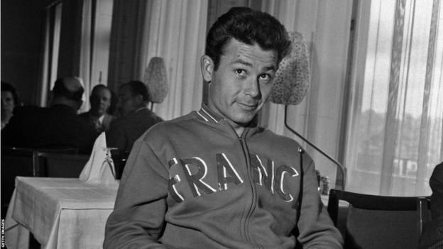 Just Fontaine wearing a France tracksuit