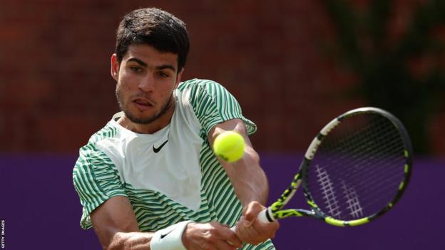 Carlos Alcaraz playing at Queen's