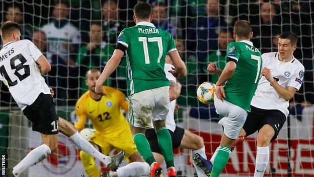 Niall McGinn fires home Northern Ireland's opener in the victory over Estonia in Belfast