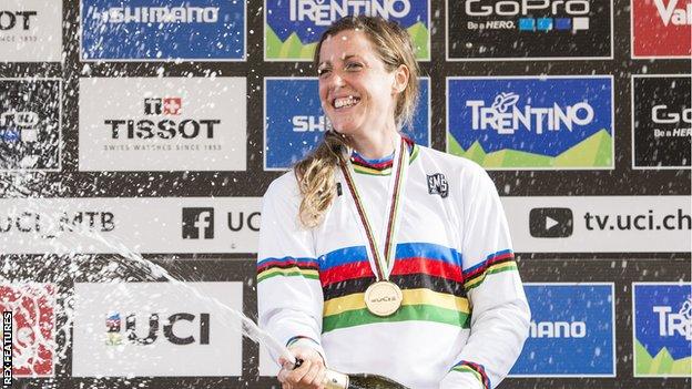 Rachel Atherton sprays champagne after being crowned world champion in 2016