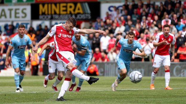 Paul Mullin's early penalty for Wrexham kick-started a play-off thriller against Grimsby