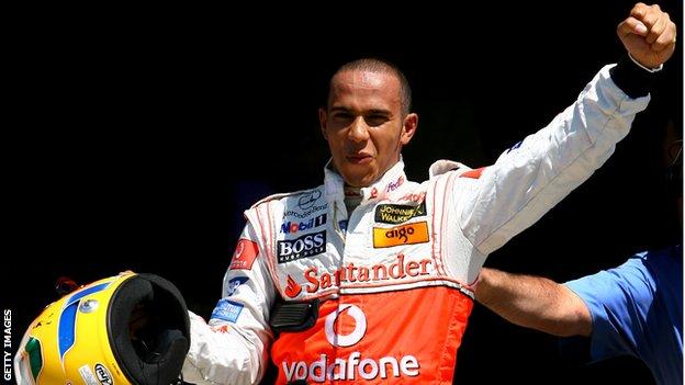 Lewis Hamilton celebrates his first pole position in 2007