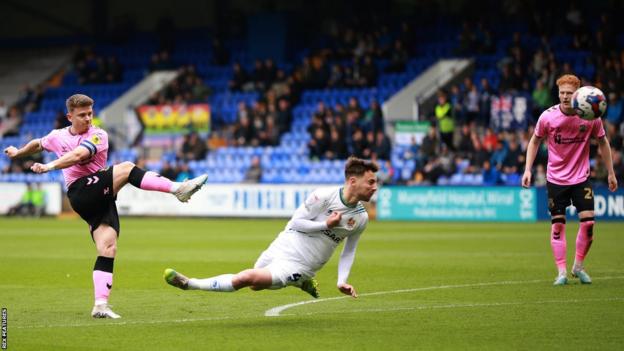 Sam Hoskins volleys Northampton Town head against Tranmere Rovers