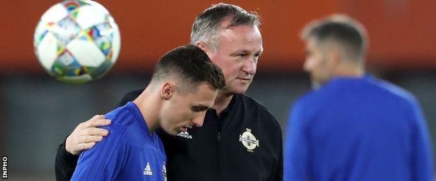 Michael O'Neill with Gavin Whyte at Northern Ireland training in Vienna on Thursday night