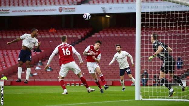 Raheem Sterling scores Manchester City's winner against Arsenal on 21 February