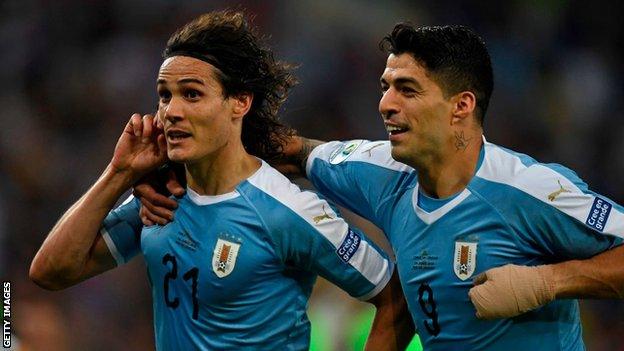 Uruguay's Luis Suarez and Edinson Cavani