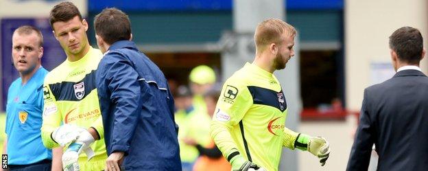 Daniel Bachmann (left) makes his Ross County debut