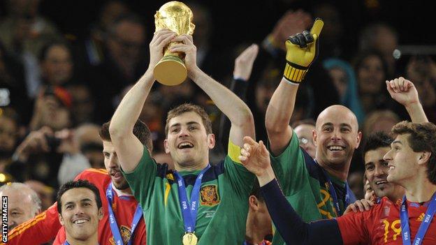 Iker Casillas lifting the World Cup with Spain in 2010
