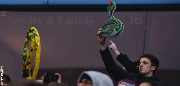 Aston Villa fans with plastic snakes
