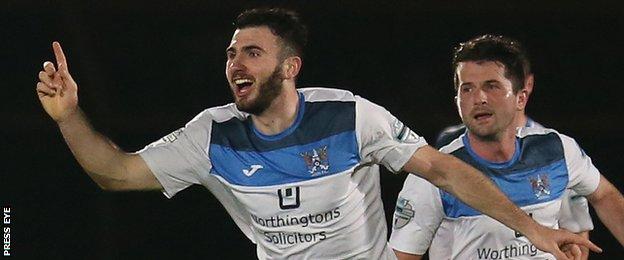 Joe McKinney celebrates after scoring one of his two goals as Ards knocked out holders Ballymena United