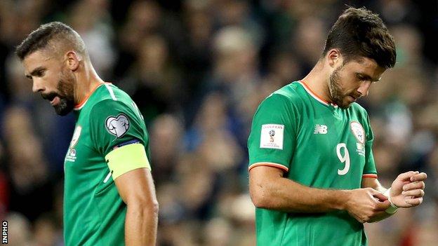 Jonathan Walters and Shane Duffy show their disappointment after the Republic's defeat