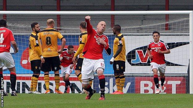 Kevin Ellison celebrates a goal against Newport, one of 15 he was directly involved with for Morecambe against his new club