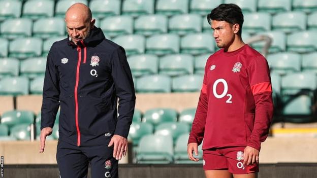 Marcus Smith with England physio Bob Stewart