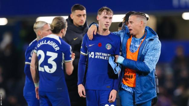 Cole Palmer of Chelsea is congratulated by team-mates