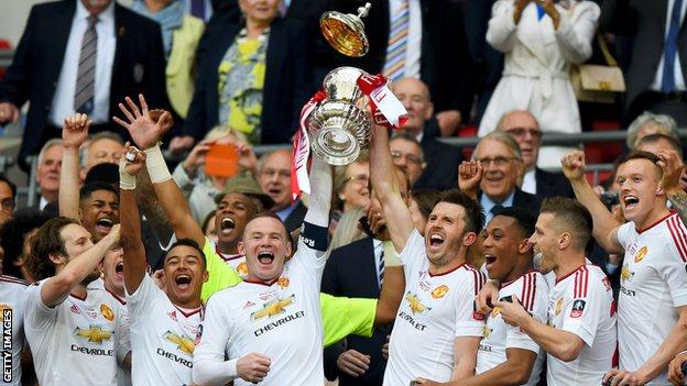 Manchester United celebrating FA Cup win in May