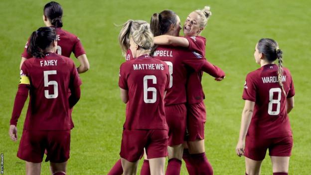 Liverpool players observe  Rhiannon Roberts' goal