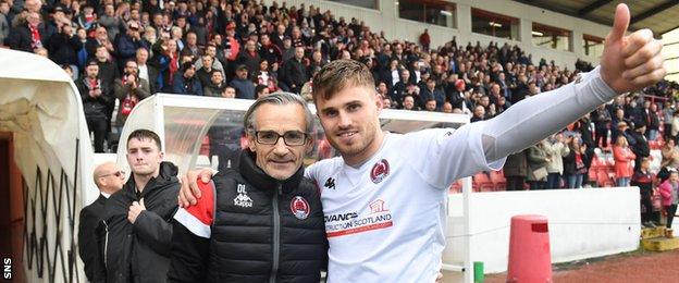 Danny Lennon and David Goodwillie celebrate Clyde's promotion to Scottish League One