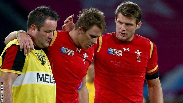 Liam Williams (centre) leaves the field during Wales' World Cup defeat to Australia in October 2015