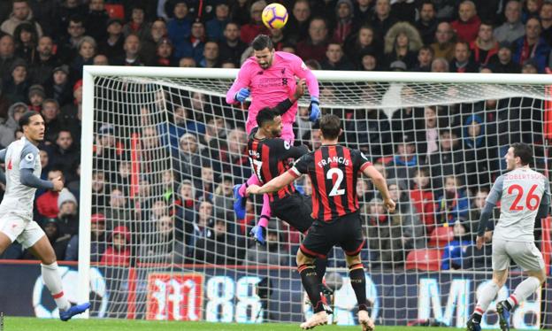 Alisson in action against Bournemouth