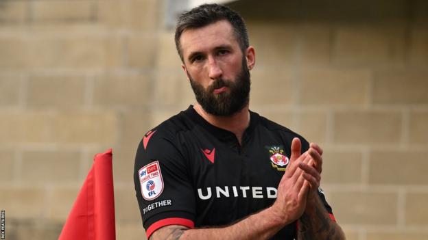 Wrexham's Ollie Palmer applauds the fans