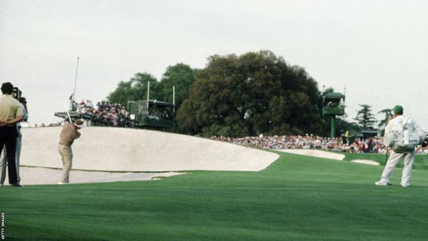 Sandy Lyle hits the ball out of the bunker on the 18th fairway at Augusta National on his way to winning the 1988 Masters