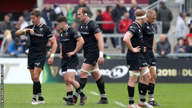 Ospreys players are dejected after being defeated