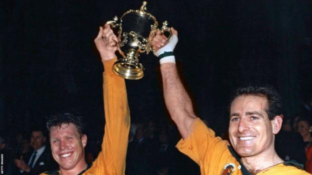 Nick Farr-Jones and David Campese with the 1991 World Cup trophy