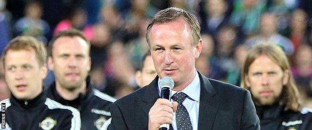 Michael O'Neill addresses the Windsor Park crowd after Northern Ireland's win
