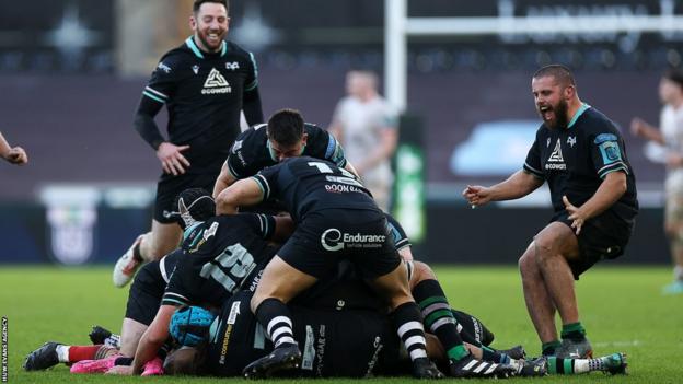 Ospreys players celebrate